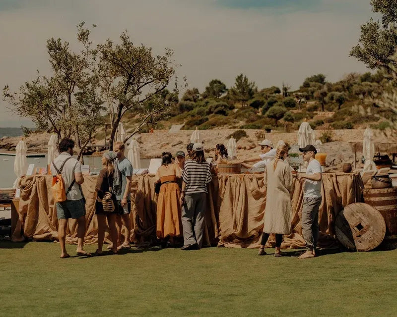 People gathered outdoors at a GenzGoodz community event